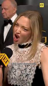 In the first look at the Francis Ford Coppola-directed film, 'Megalopolis,'  Adam Driver stops time while standing at the edge of a skyscraper.