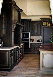 Elegant Distressed Black Kitchen Cabinets With Hardwoord Floors Black Distressed Cabine Distressed Kitchen Cabinets Distressed Kitchen Outdoor Kitchen Cabinets