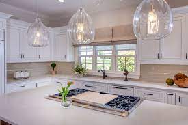 Home styles kitchen island with distressed oak top. Designer White Kitchen With Walnut Island Transitional Kitchen Charlotte By Walker Woodworking Houzz
