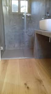 In this bathroom, the gray wood tile is used for the floor and wall above the vessel sink, since tile makes a better backsplash than wood. High Tech Floor Home Facebook