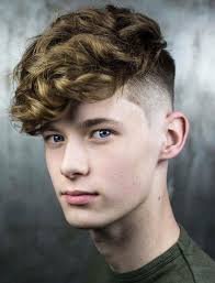 For this hairstyle, ask for a short buzz on the sides. 15 Best Hairstyles For Teenage Guys With Wavy Hair