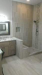 The large format hexagon floor tiles used on the bathroom floor are an attractive touch as well. Vertical Tile Shower Houzz