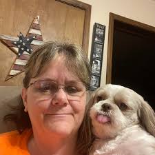 What can be done to help a dog with itching, scratching, and paw licking  without taking it to the vet?