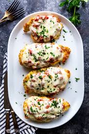 Breaded chicken cutlets are baked, not fried yet the chicken is so moist and full of flavor. Oven Baked Chicken Parmesan