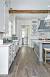 Cherry Wood Cabinets With Gray Flooring