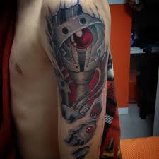 A dark handprint tattoo featuring the initial m at its center is a nod to the mexican mafia, a widespread california prison gang that is steeped in racism and hatred. Biomechanical Skin Rip Tattoo Best Tattoo Ideas Gallery