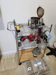 The heat comes from a heat gun that's placed under a modified flour sifter, and one advantage is that this design allows you to see the beans. Thomas Meeks Diy Flour Sifter Coffee Roaster Sweet Maria S Coffee Library