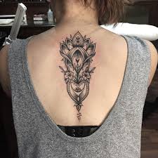 Back is the largest area of canvas on the body. 83 Attractive Back Tattoo Designs For Women