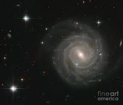 It is considered a grand design spiral galaxy and is classified as sb(s)b. Barred Spiral Galaxy Ugc 12158 Photograph By Science Source