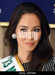 In this Friday, Dec. 20, 2013, photo, friends Kent Adkins. left, Brian  Young, center, and Jason Davis relax and talk at the bar in the Zodiac  Lounge