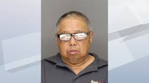 Police officer frees skunk with container stuck