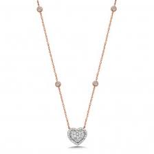 heart diamond pendant set in rose gold