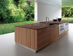 Flesh wood grain kitchen cabinet this dinning room had designed a low height cabinet in front of the big window. Contemporary Kitchen From Ged Cucine The Fiamma Kitchen