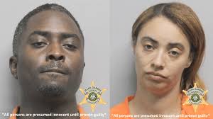 Two arrested after woman found dead