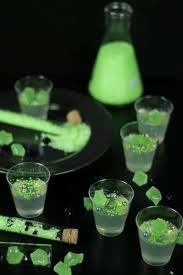 Light Up Your Halloween Party With A Round Of Boozy Glow In The Dark Jello Shots These Classy Gelatin Treats Tas Jello Shots Jello Shot Recipes Cocktail Shots