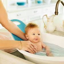 You will need warm water in a basin or bathtub, pure epsom salt (without any additives, like fragrances or oils), and a towel. Munchkin Sit Soak Tub Snuggle Bugz