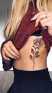 But don't make hasty conclusions — rose rib tattoo can be perfect for men. 50 Beautiful Rose Tattoo Ideas Tattoos For Women Flowers Rib Tattoos For Women Side Tattoos Women