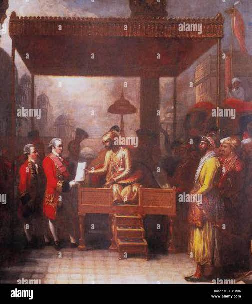 The depiction of Robert Clive receiving the Diwani (right to collect taxes) from Mughal Emperor Shah Alam II marks a significant moment in the British colonization of India, symbolizing British control over