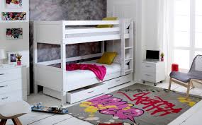 The table itself only needs 6 inches of clearance and easily rolls in and out from under a child's bed on four casters. Flexa Nordic Bunk Bed 2 Rainbow Wood