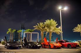 Luxurious Three Expensive Lamborghini Aventadors Are Lined Up With Their Doors Open Alongside A Maserati Quattroporte In Bugatti Veyron Super Cars Luxury Cars