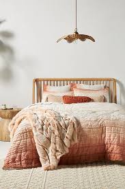 Want to take coziness to the next level in the living room? Alpine Faux Fur Throw Blanket Anthropologie