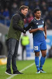 Coach Julian Nagelsmann Of Hoffenheim Speaks With Serge Gnabry Of Serge Gnabry Coach Julian