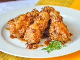 Chicken wings are egged and fried in butter, then baked in a tangy sauce of soy sauce, water, sugar, vinegar, garlic powder and salt. Crispy Honey Garlic Chicken Wings Rock Recipes