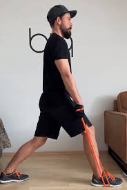 Stand up with your left leg and kick your right leg out and up behind you. Lunges With Resistance Bands Biqbandtraning