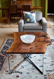Large live edge redwood coffee table constructed from a rustic redwood slab on legs. Live Edge Coffee Table With Metal Base The Joinery