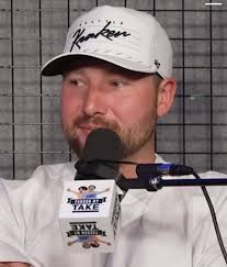 Von Miller wearing an autographed Von Miller hat 😂👍