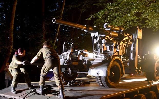 Second World War tank and anti-aircraft gun found hidden in basement of  villa in Germany