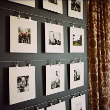 25 Examples Of How To Display Photos On Your Walls Architecture Art Designs Gallery Wall Display Family Photos Photo Wall Gallery