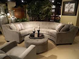 Don't try and 'stretch' a small rug into the room and then have all the furniture floating around it. Curved Sectional Round Couch Round Sofa Living Room Decor Gray
