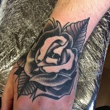 Maybe you would like to learn more about one of these? Traditional Black Rose Tattoo Design On Hand Parryz Com