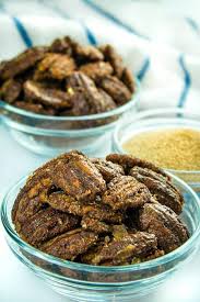 There are 691 calories (on average) in 100 g of pecans. Easy Low Carb Candied Pecans Holistic Yum