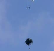 Unmanned helicopter demonstrates impressive cargo airdrop