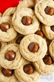 The best recipe for soft thumbprint hershey kiss cookies (a.k.a peanut butter blossoms). Peanut Butter Blossom Cookies Table For Two By Julie Chiou