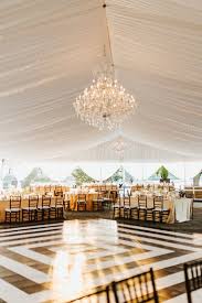 Black And White Dance Floor Wedding Fabric Draped Tent With Crystal Chandeliers And A Stunning Black And White Dance Floor At This Dance Floor Wedding White Tent Wedding Wedding Venue Decorations