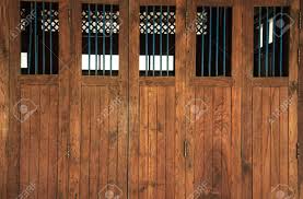 Wooden cottage pane double door with frame. Vintage Retro Wooden Doors And Window Panes With Bars Home Interior Stock Photo Picture And Royalty Free Image Image 107252805
