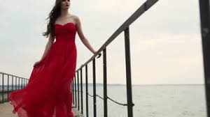 See more ideas about bbc wife, hot high heels, hot heels. Brunette Wearing Red Chiffon Dress Is Standing On A Quay In Cloudy Summer Day Wind Is Swaying Her Skirt Woman Is Looking In A Distance Camera Is Moving Stock Video Footage