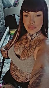 Has anyone experienced this before? Blister like spots and if scratched  feels like you've just been burned.. tattoo is 15 years old. I'm going for  a cover up and am little anxious