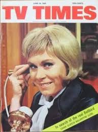 A classic scene showing a GMC truck A Wolseley and a Morris Minor sharing  the old bridge with a sheep farmer moving stock across at Gundagai in 1953!  Mitchell Library