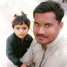 My Sardar boys, Rehras & Aad Sach riding a camel at sunset