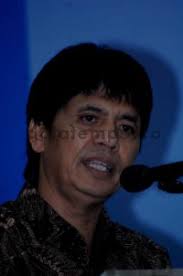 EFFENDY SIMBOLON DAN AAS ASIKIN IDAT