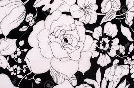 It's printed with a green, navy, white and tangerine floral print that. Graphic Floral Pattern On Fabric Black And White Flowers Print Stock Photo Picture And Royalty Free Image Image 61892321