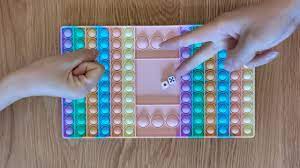 Pop it toys and games are similar to fidget spinners and other types of sensory toys that are used to relieve stress or alleviate the symptoms of conditions including adhd and autism. How To Play Chess Board Pop It Fidget Game 2021 Youtube
