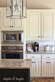 Adding a backsplash to your kitchen is a great way to create atmosphere with color and texture. Dimples And Tangles 2013 A Look Back Subway Tile Backsplash Kitchen Kitchen Tiles Backsplash Kitchen Tiles