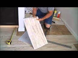 Trafficmaster ceramica tiles are resilient vinyl floor tiles designed to closely resemble natural stone or ceramic. Trafficmaster Ceramica 12 X 24 Vinyl Tile Floor Installation Youtube