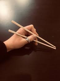 (pics/video) | live japan travel if you are unfamiliar with how to hold chopsticks properly, getting the hang of them can be tricky. How To Hold Chopsticks 11 Steps Instructables