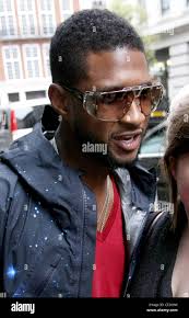 Usher outside the may fair hotel london hi-res stock photography and images 